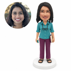custom bobblehead figure female teacher in a blouse and trousers holding a book and a marker