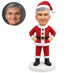 custom bobblehead figure male Santa with both hands on hips; original own-site sculpted polymer-clay head and matching human photo.