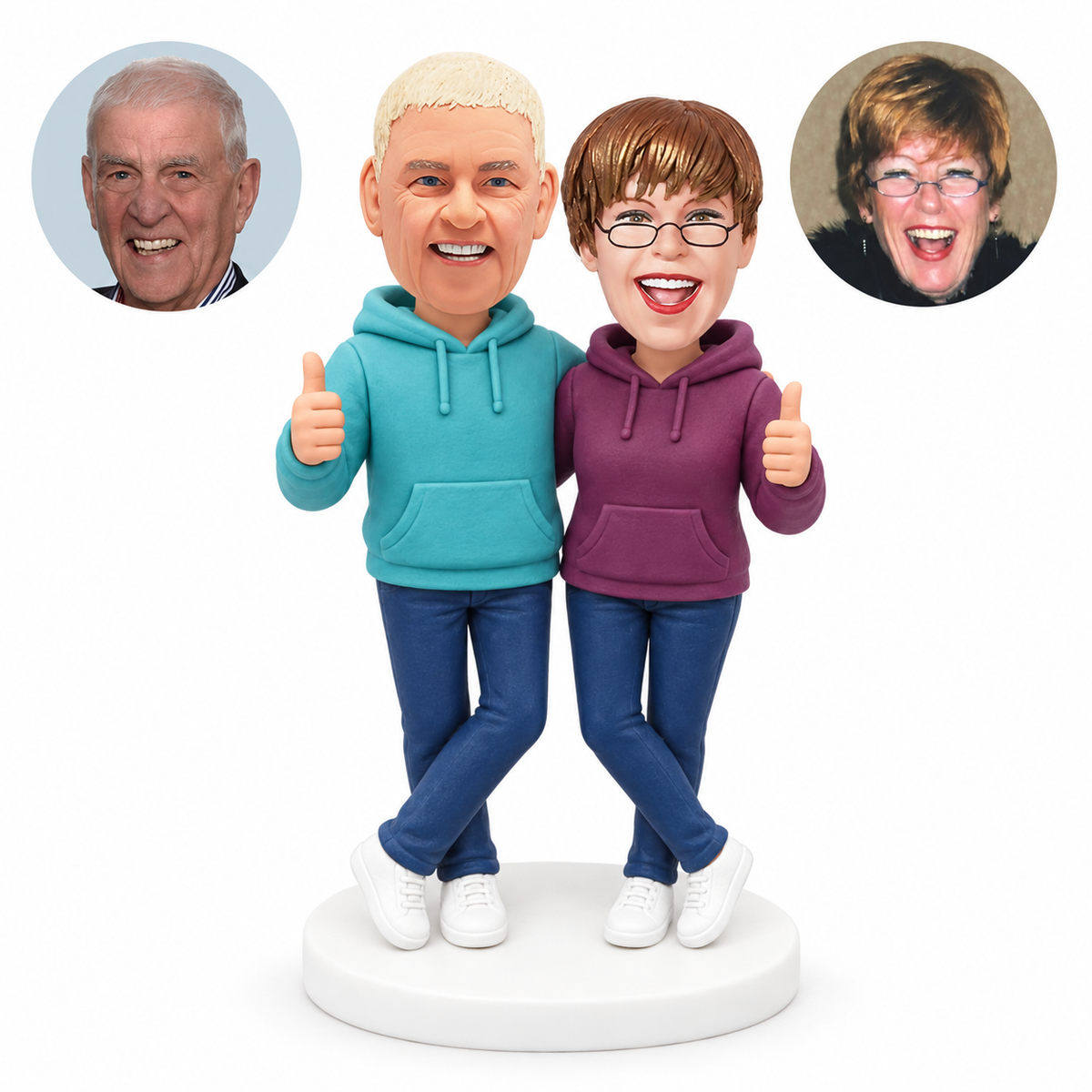 custom bobblehead figures hoodie couple giving thumbs up with crossed ankles; original Bobblefigurine polymer clay heads and matching separate circular human portraits.