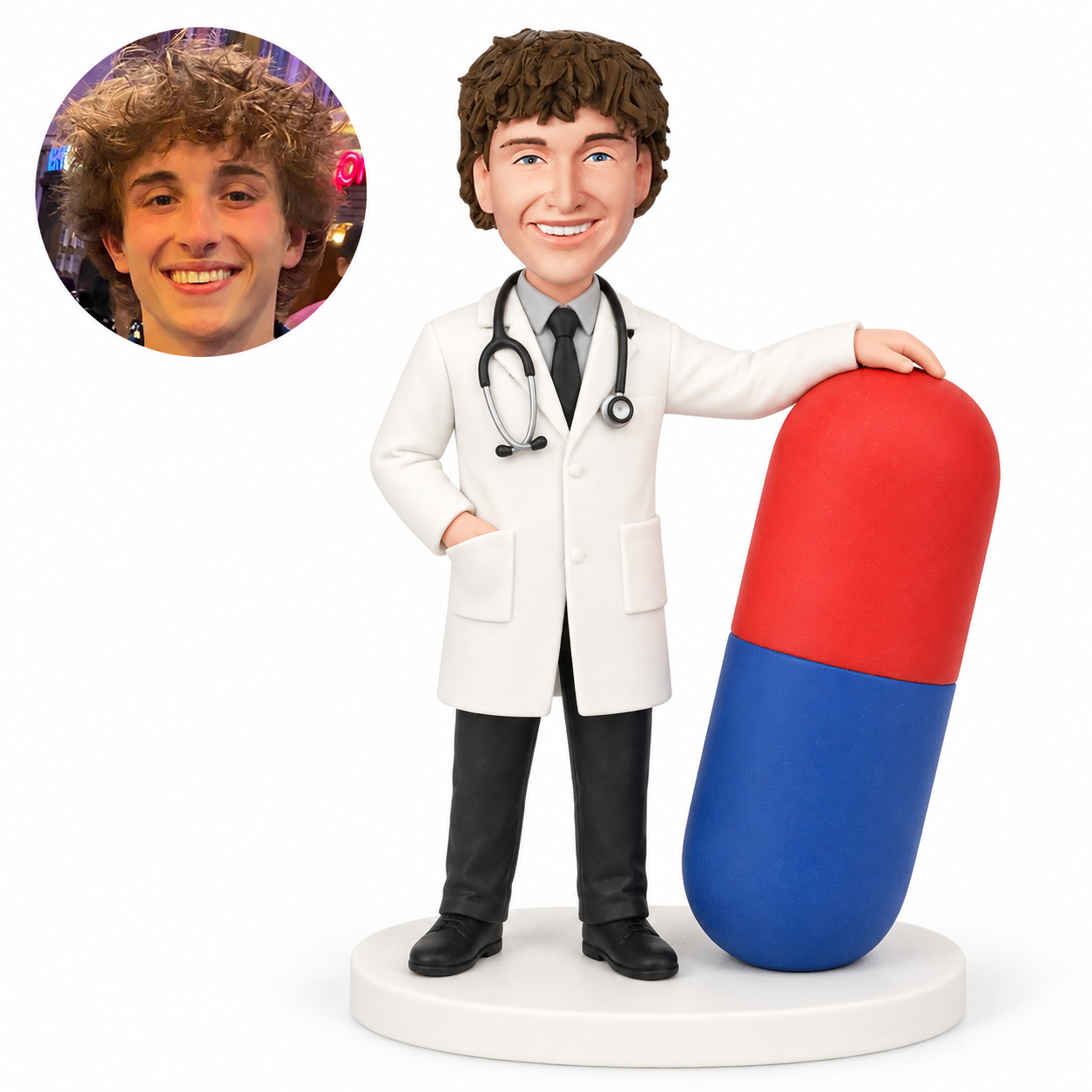 custom bobblehead figure male doctor resting hand on giant capsule; original Bobblefigurine polymer clay head and corresponding circular real portrait.