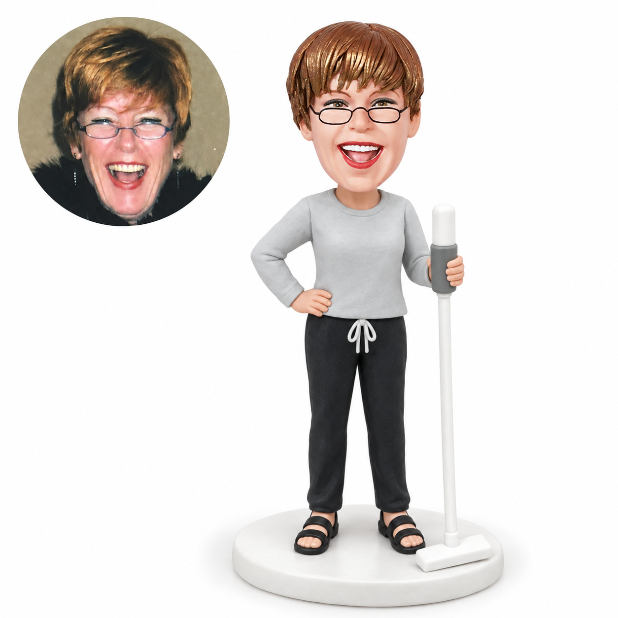 custom bobblehead figure female cleaner holding an upright mop with one hand on hip