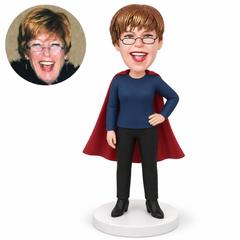 custom bobblehead figure woman in a cape with one hand on her hip and the other arm down