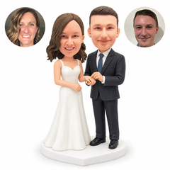 custom bobblehead figures standing wedding couple exchanging rings