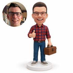 custom bobblehead figure man in a plaid shirt carrying a toolbox and giving a thumbs up