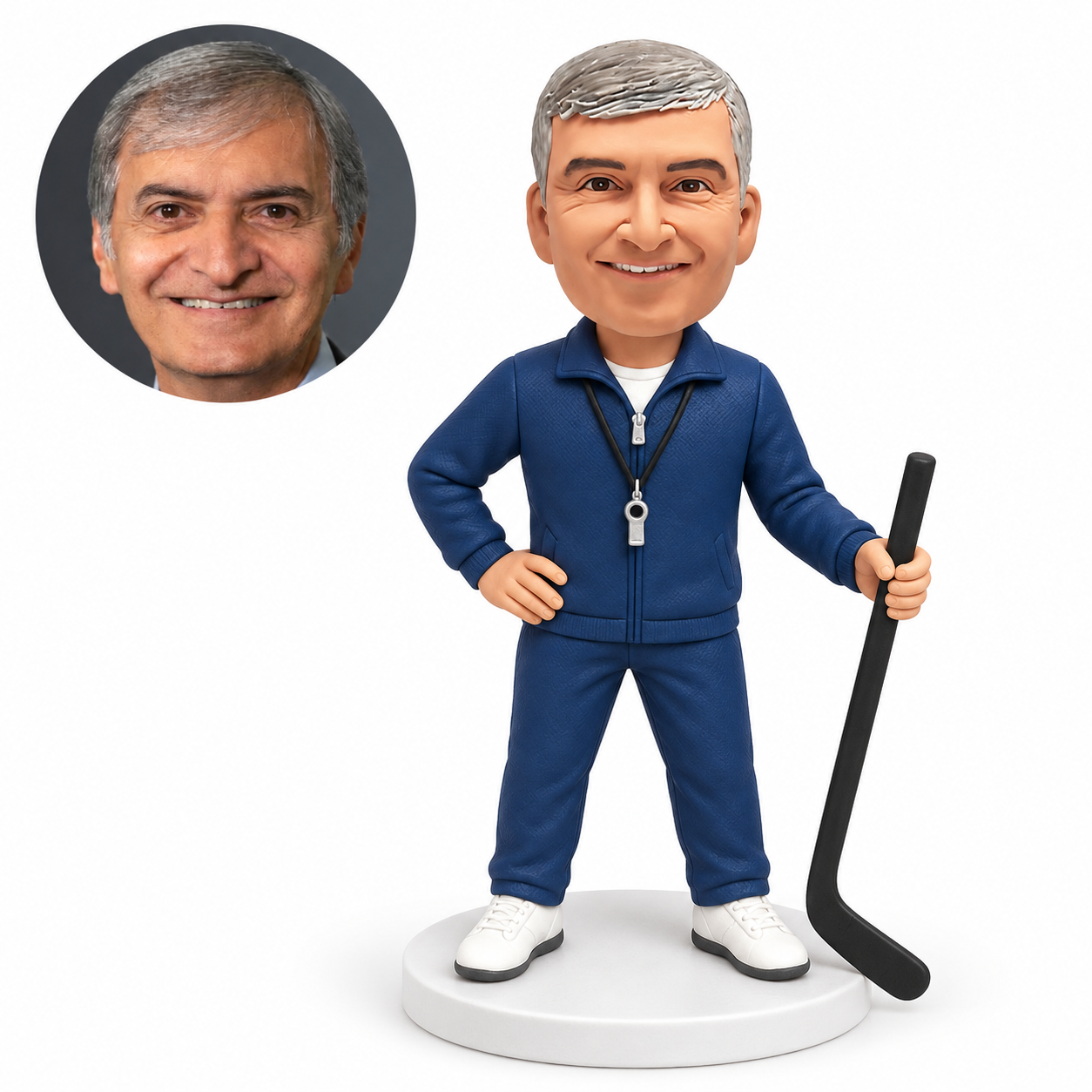 custom bobblehead figure male hockey coach in a tracksuit with one hand on his hip and a stick