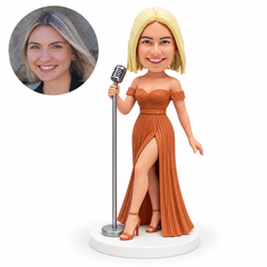 custom bobblehead figure female singer in a slit evening gown holding a vintage microphone on a stand