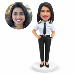 custom bobblehead figure female airline captain in a short-sleeve shirt with one hand on her hip and one in her pocket