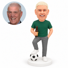 custom bobblehead figure man holding a beer bottle with one foot resting on a soccer ball – original polymer-clay sculpture head and matching photo