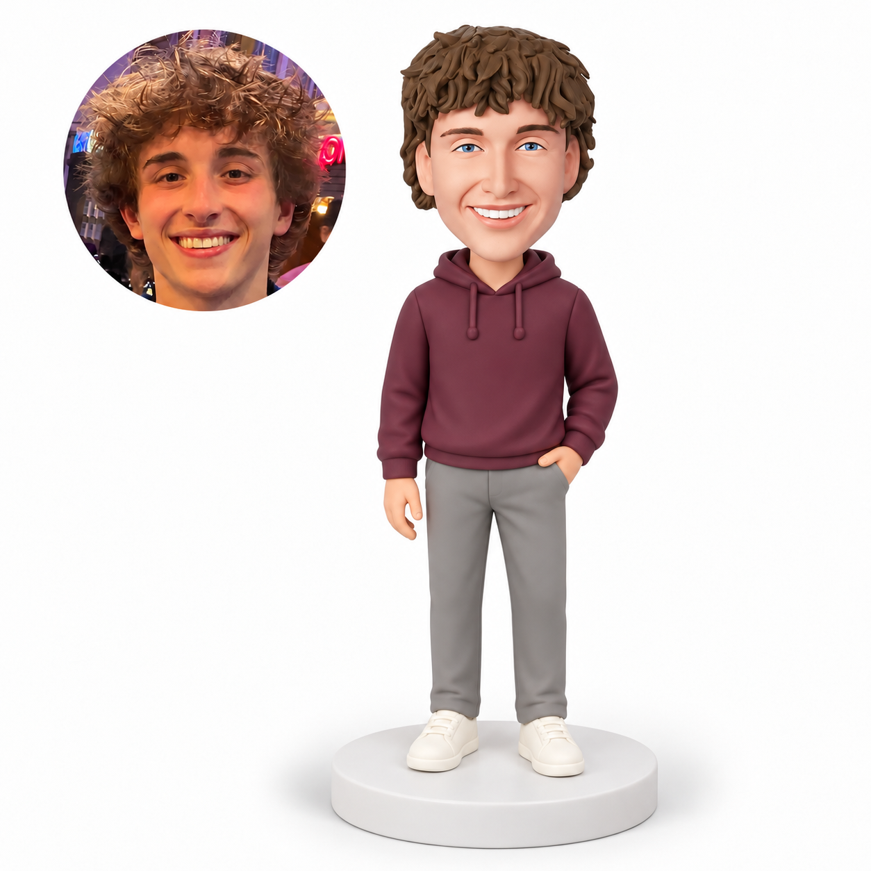 custom bobblehead figure man in a hooded pullover with one hand in a trouser pocket and his other arm down MGA-AC1234