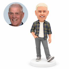 custom bobblehead figure man in an open plaid shirt with one hand in a pocket extending one foot forward MGA-AC1257