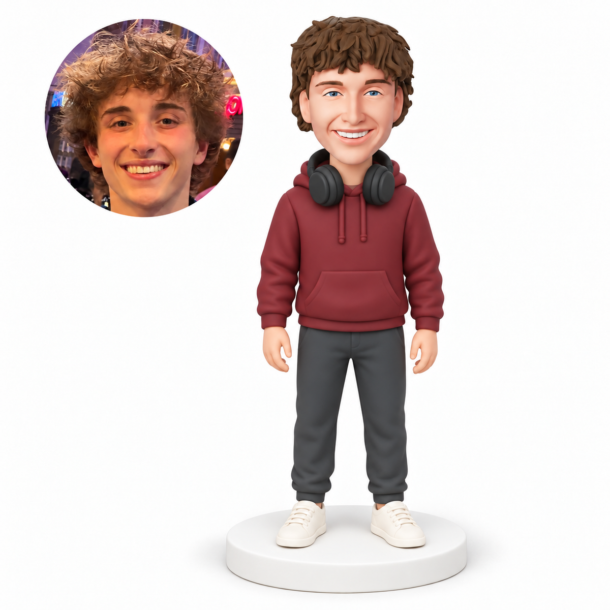 custom bobblehead figure man in a hoodie with headphones around his neck and both arms down MGA-AC1261