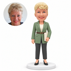 custom bobblehead figure businesswoman in a belted blazer holding a folder low with her other arm down
