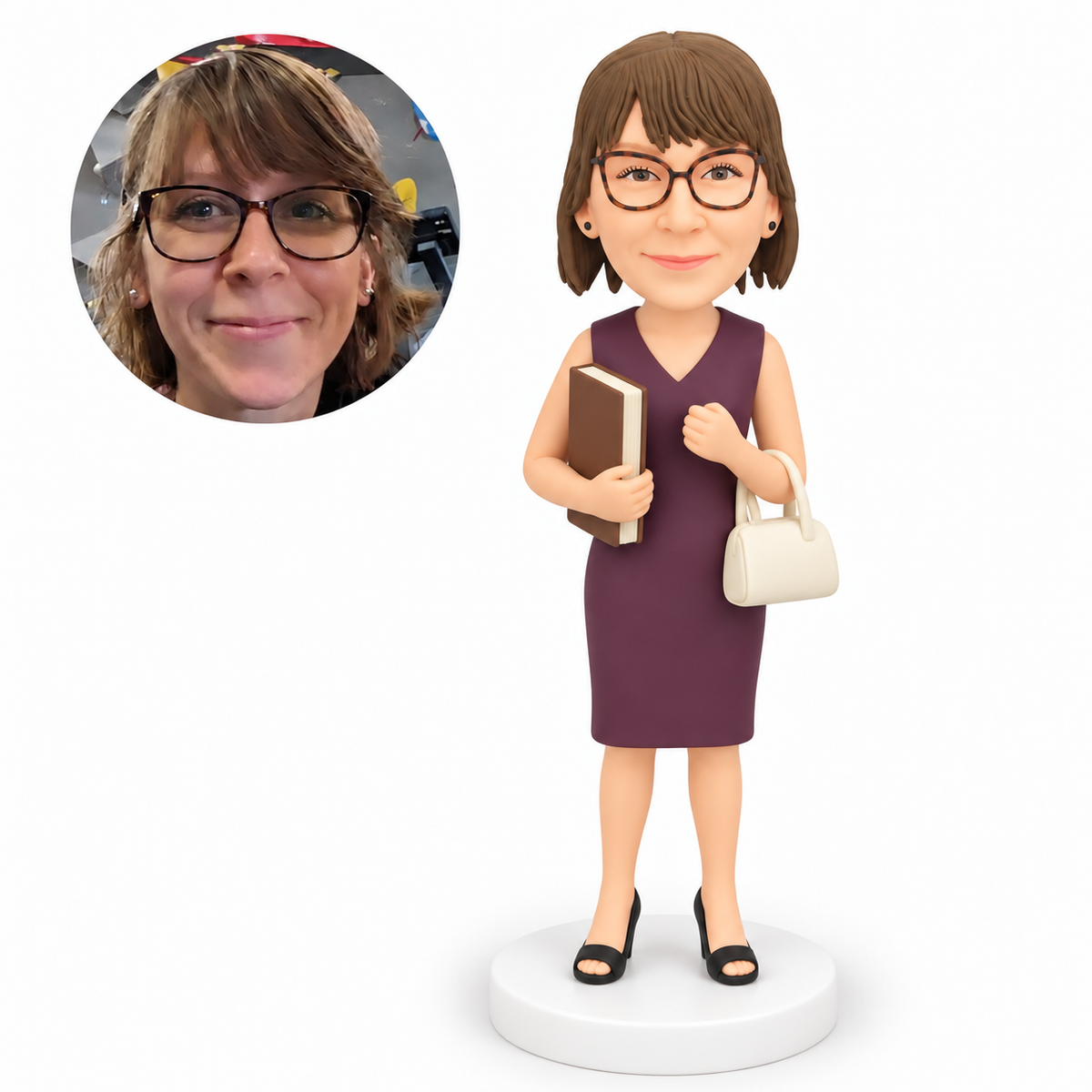 custom bobblehead figure woman in a sleeveless knee-length dress holding a book with a handbag on her elbow