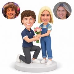 custom bobblehead figures couple with a kneeling man and woman holding a bouquet together