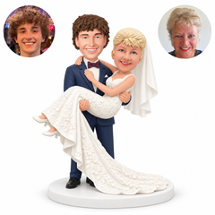 Wedding couple bobbleheads with groom carrying bride and long gown train - MGA-AC1414