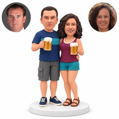 custom bobblehead figures couple in summer shorts each holding a beer mug while embracing at the waist - existing original polymer clay head and matching real photo