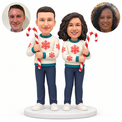 custom bobblehead figures Christmas couple each holding an upright candy cane with both hands