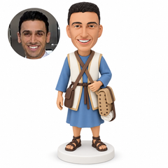 custom bobblehead figure man in an ancient tunic and open vest with two crossed straps and two side bags