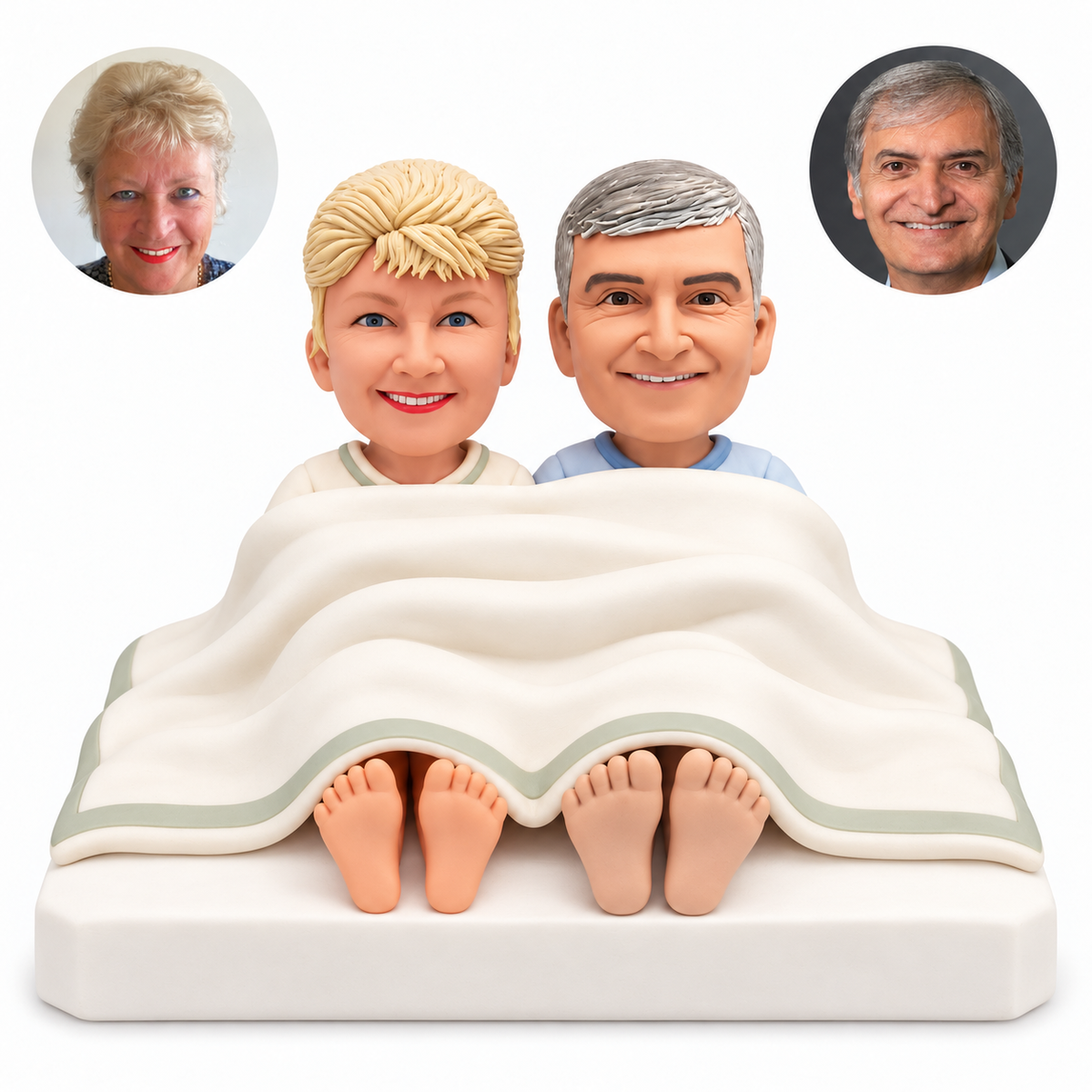 custom bobbleheads figures couple sitting up in bed under one quilt with their feet visible