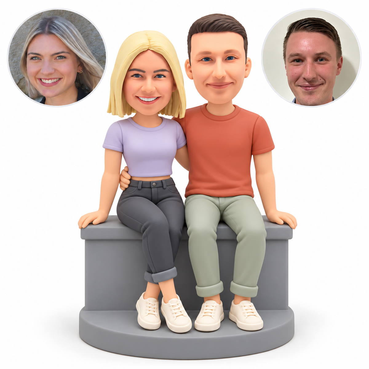 custom bobbleheads figures couple sitting on a low wall with their inner arms around each others waist