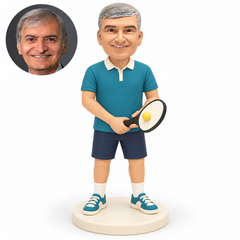custom bobblehead figure man holding a paddle with both hands and a ball resting on its face