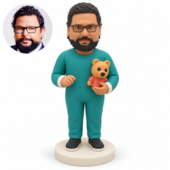 custom bobblehead figure man in a long-sleeved onesie holding one toy bear with his other hand empty in front