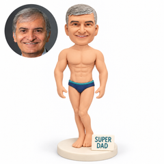 custom bobblehead figure male standing with both empty arms down beside a small super dad ground plaque
