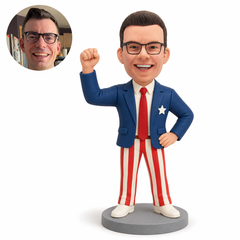 Custom polymer clay bobblehead businessman in patriotic blazer and striped trousers with one fist raised, with matching portrait