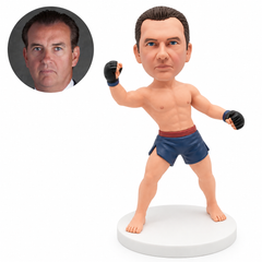 Barefoot boxer in a wide leaning stance with both black fingerless gloved fists extended