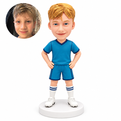 Custom clay bobblehead blonde boy soccer player standing with both hands on hips in teal blue kit
