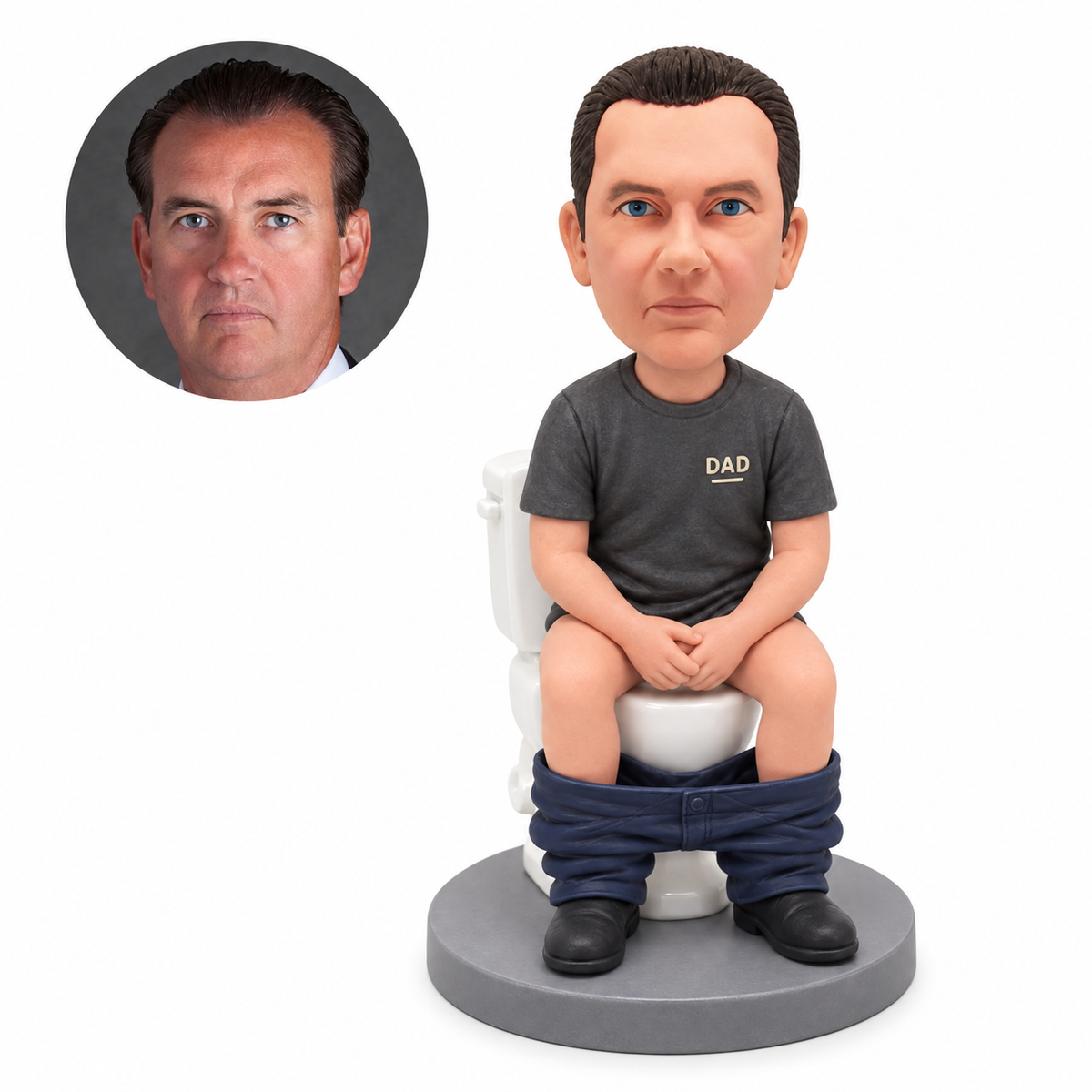 Custom clay bobblehead man seated on a toilet with hands clasped and trousers at ankles