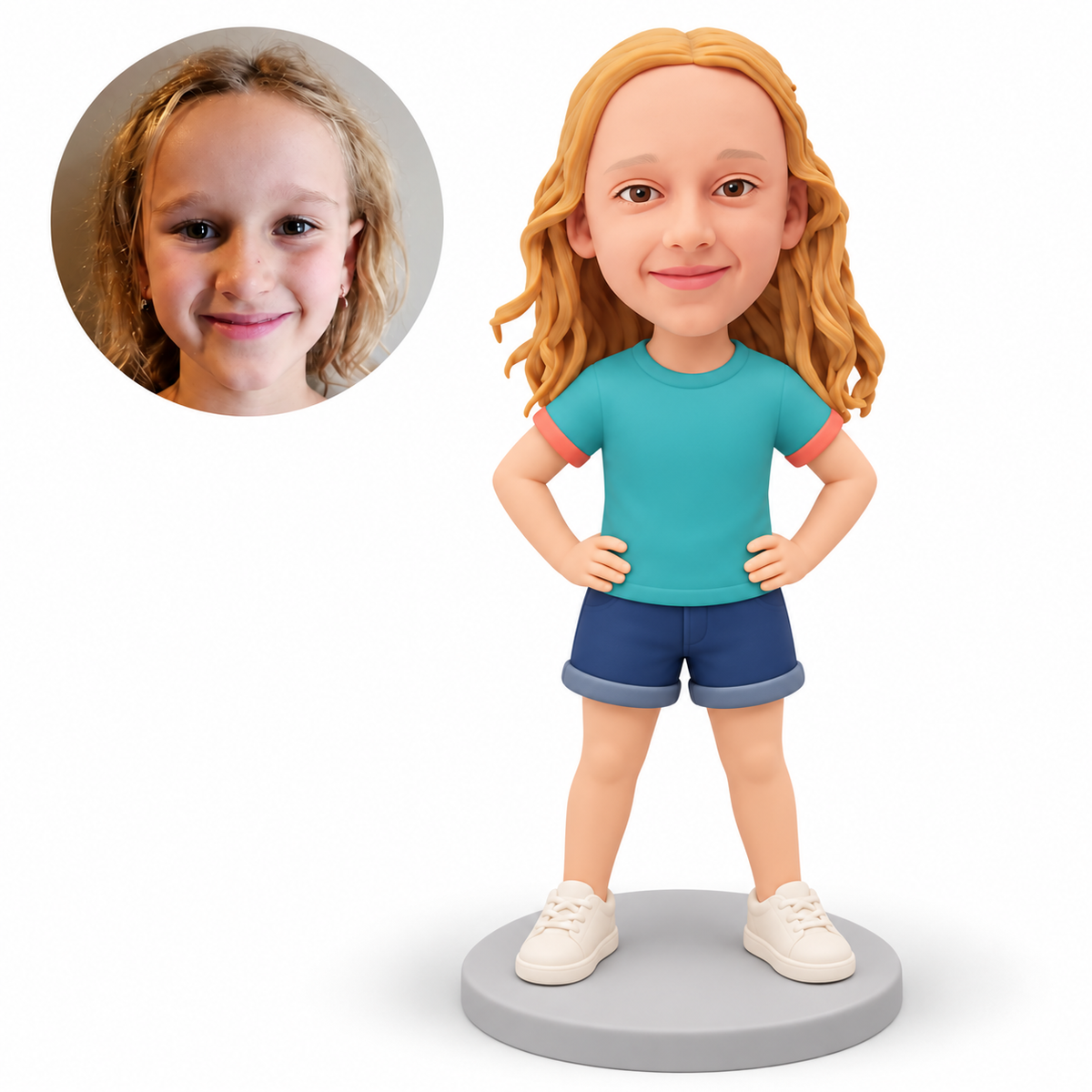 Custom polymer-clay young girl in a teal T-shirt and navy shorts with both open palms on her hips and both sneakers planted, with matching real child portrait
