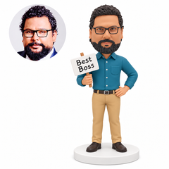 Custom polymer-clay man in a teal shirt holding a short-handled Best Boss sign in his right hand with his left palm on his hip, standing on a plain round base, with matching real portrait