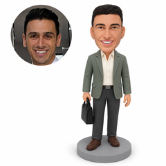 custom bobblehead figure man carrying a bag in his right hand with his left arm down
