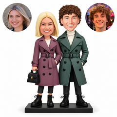 Custom clay coat couple: woman carrying a black handbag with her inner hand in a coat pocket, man with outer hand in a pocket, four flat boots, and matching real-photo circles. MGA-AC1791.