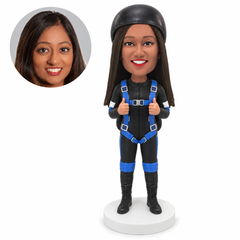 custom bobblehead figure female skydiver wearing a parachute harness