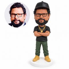 custom bobblehead figure hip hop performer in a T shirt and loose trousers with his arms crossed