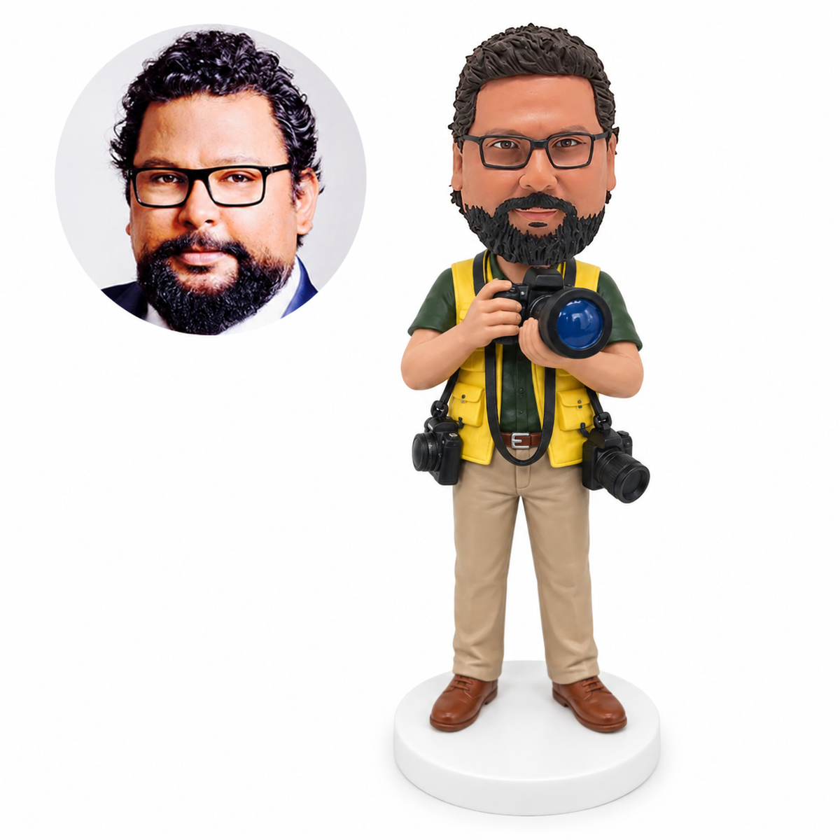 custom bobblehead figure photographer in a utility vest with a large camera and two cameras at his waist