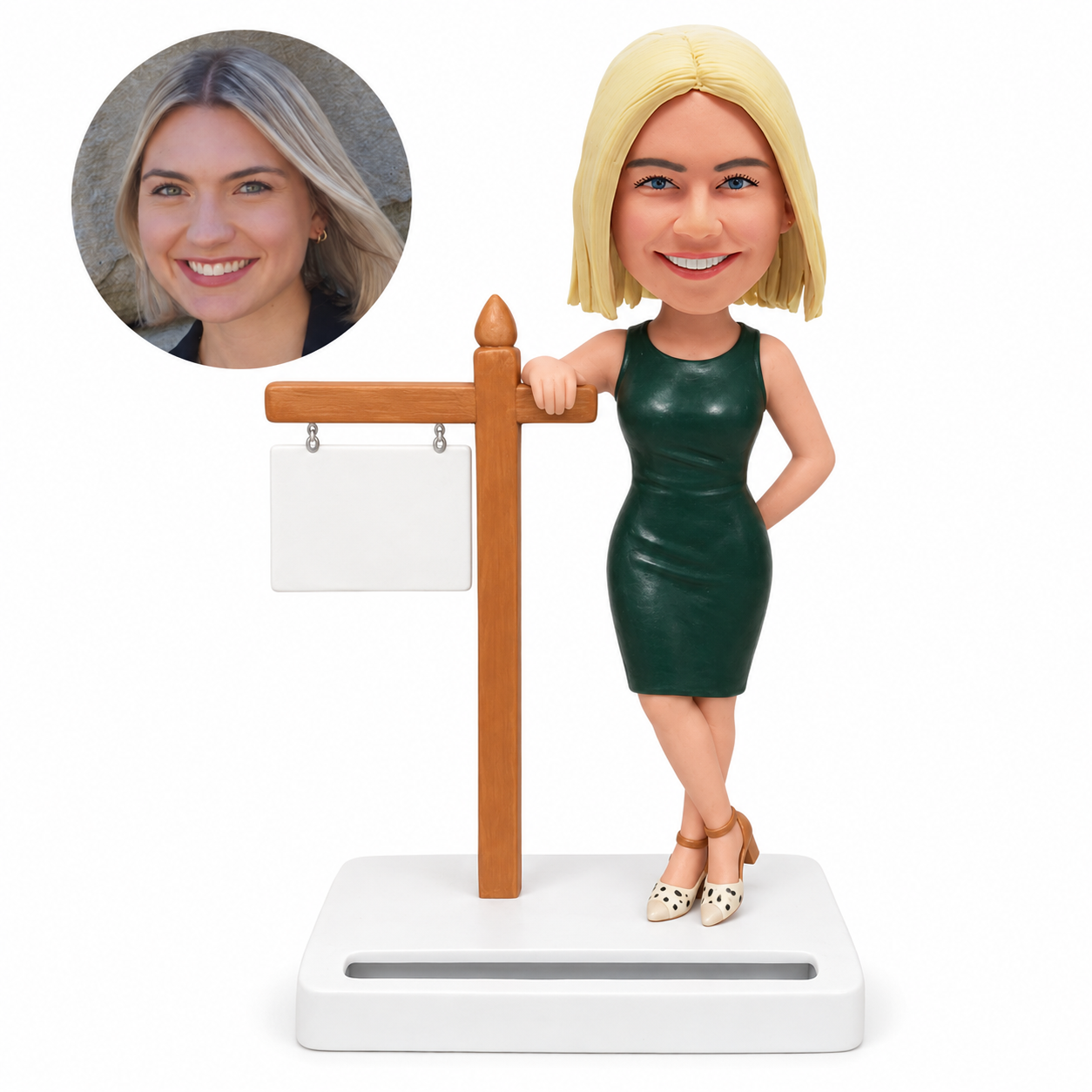 custom bobblehead figure female real estate agent in a green dress with a business card stand