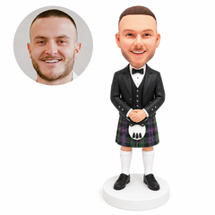 custom bobblehead figure man in a formal jacket and tartan kilt with his hands clasped
