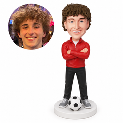 custom bobblehead figure male soccer coach with crossed arms and a soccer ball