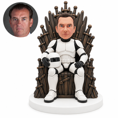 custom bobblehead figure man in white space armor seated on a sword-shaped throne holding a helmet