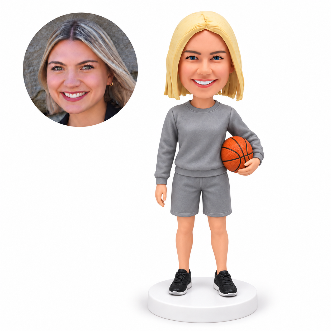 custom bobblehead figure female basketball coach in a sweatshirt and shorts holding a ball at her hip
