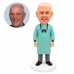 custom bobblehead figure male medical professional in a surgical gown with loupes