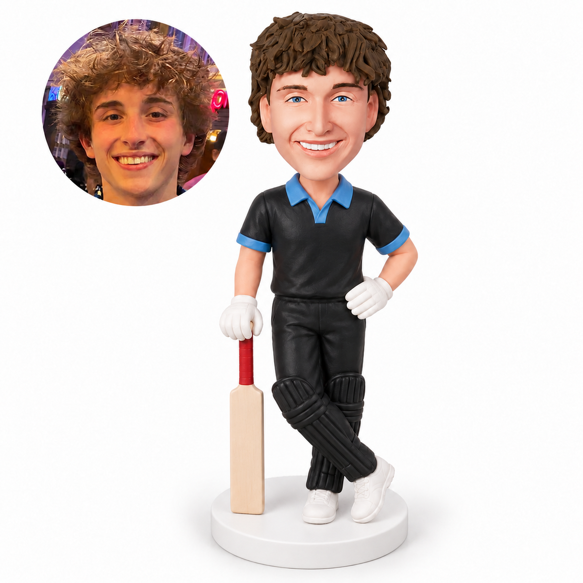 custom bobblehead figure male cricket player resting on a bat with crossed ankles