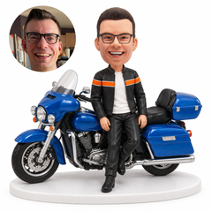 custom bobblehead figure male rider leaning beside a blue touring motorcycle