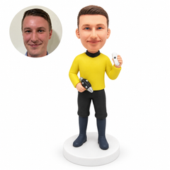 custom bobblehead figure space explorer in a yellow top holding two small devices