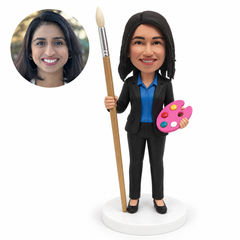 custom bobblehead figure female painter in a blazer holding a tall paintbrush and a palette