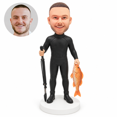 custom bobblehead figure scuba diver holding a speargun and a fish