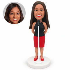custom bobblehead figure female singer in a halter top and skirt with a microphone stand